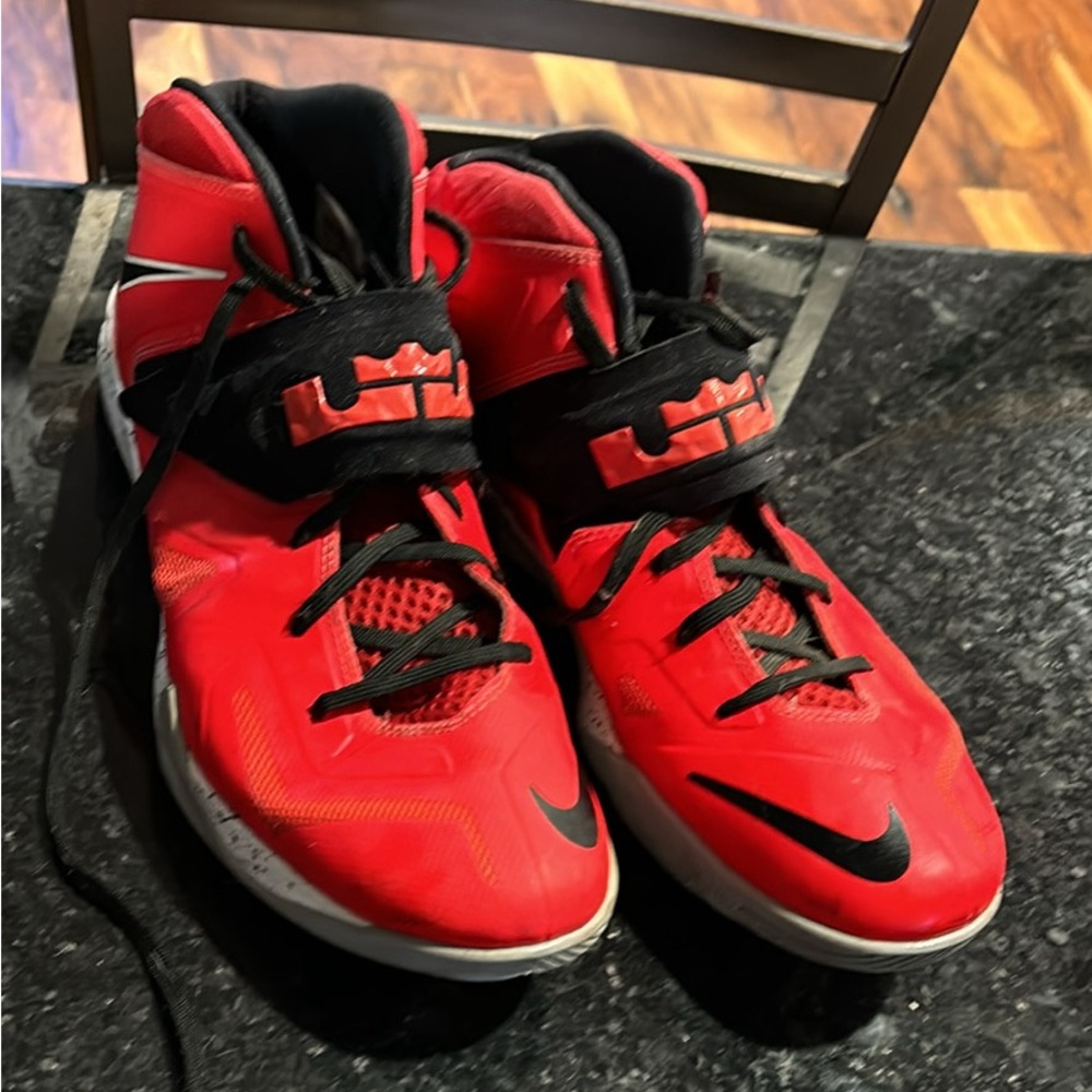 Nike lebron shoes size 11.5 a bit dusty from storage otherwise good shoes .
